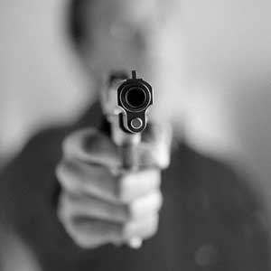 pointing gun at camera